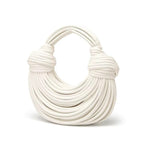 Gouden gedraaide handtas