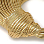 Gouden gedraaide handtas