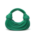 Gouden gedraaide handtas