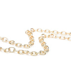 Parelwitte clutch met gouden ketting