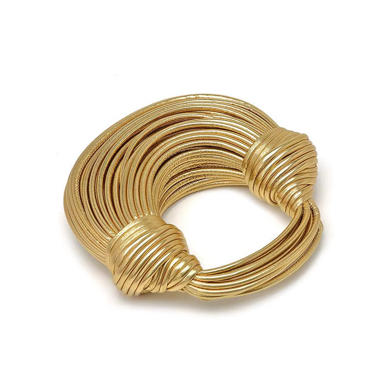 Gouden gedraaide handtas